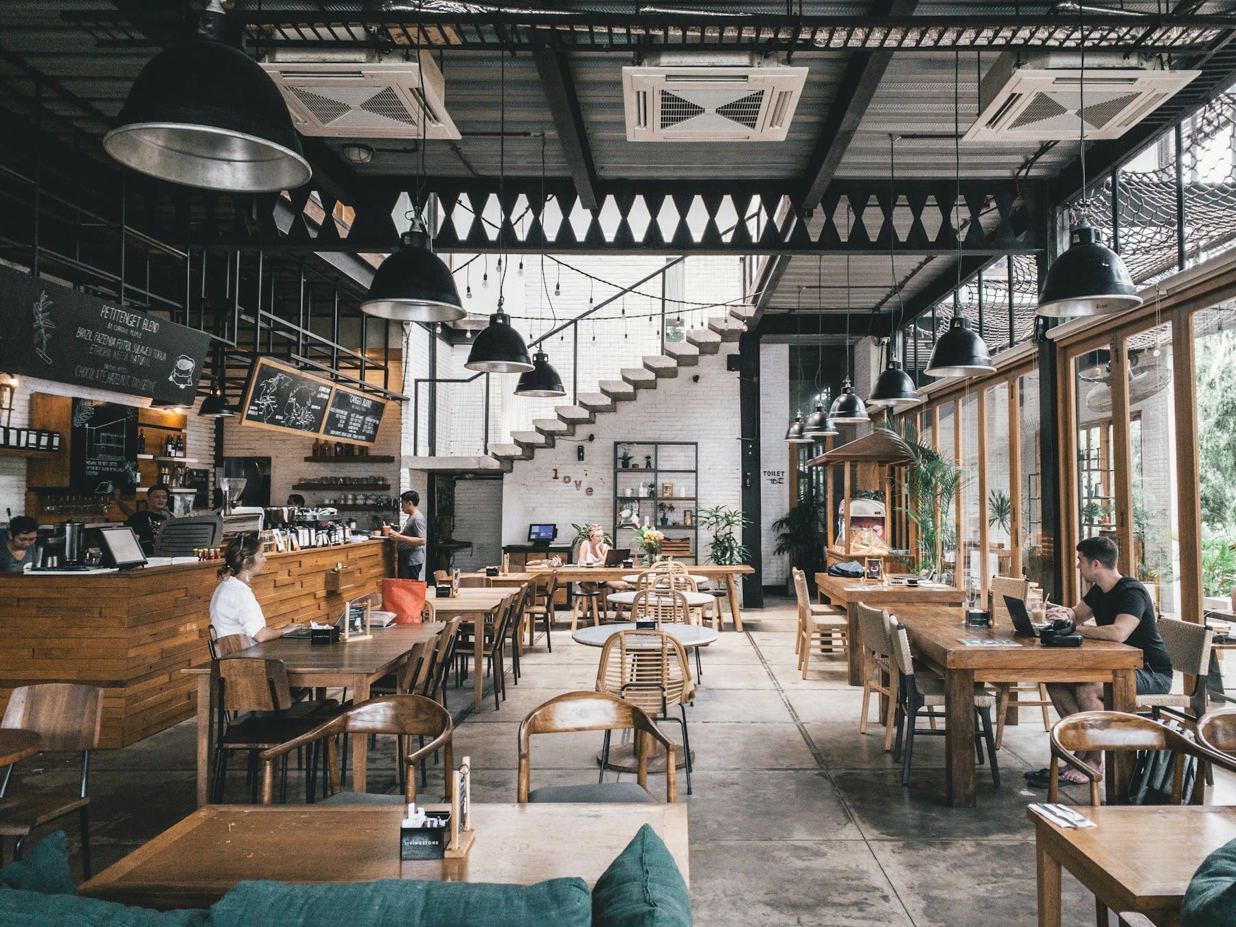 Restaurant dining tables set for service